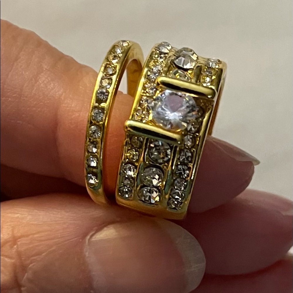Size six gold colour ring bands with clear stones